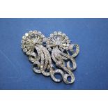 An 18ct white gold diamond double clip brooch, approx 4ct total.