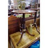 A pair of Regency style rosewood and brass octagonal tripod tables, 46cm wide.