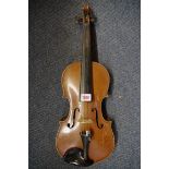 An antique Continental violin, with 14 in back, cased and with bow.