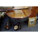 An 18th century mahogany demi-lune tea table, 73cm wide.