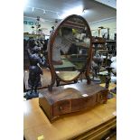 A George III mahogany toilet mirror, 43cm wide.