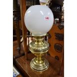 A brass converted oil lamp, total height 45cm.