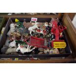 A quantity of Britains farmyard animals and other Britains items.