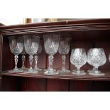 A collection of cut glass drinking glasses and similar.