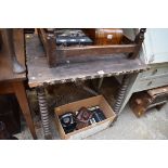 An antique walnut gypsy table, with reel turned supports, 70cm wide.