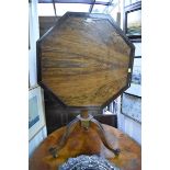 A 19th century walnut, mahogany and brass strung octagonal tilt-top tripod table, 73cm wide.