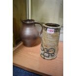Studio Pottery: a David Leach vase, 19.5cm high; together with a Muchelney jug, 19.5cm high.
