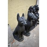 A pair of black painted composition stone Egyptian cats, 79cm high.