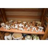 A collection of crested china and similar, to include two pieces of carnival glass.