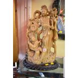 A Chinese large carved soapstone figure group, on wood stand, total height 49cm.