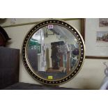 A gilt framed circular wall mirror, bearing label verso, indistinctly inscribed Dublin, 41.