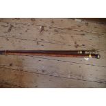 A carved ivory or bone mounted walking stick;