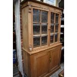 A Victorian pine cabinet, 125cm wide.