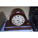 A Victorian mahogany mantel timepiece, the painted dial inscribed 'Simpson, Bognor',