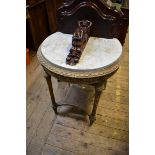 A Louis XVI style carved giltwood and marble top gueridon, 60cm diameter.