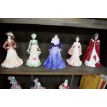 Four Coalport figures,