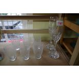 A pair of Baccarat cut glass champagne flutes; together with another set of six Baccarat glasses.