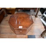 A Georgian mahogany and line inlaid octagonal casket, 27cm wide.