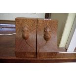 A pair of Robert Mouseman Thompson oak bookends, 14.5cm high.