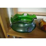 A Loetz green iridescent glass bowl, 22cm diameter.