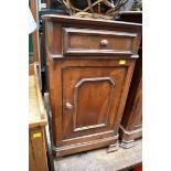 A French walnut bedside cupboard, 42cm wide; together with another similar marble top example.