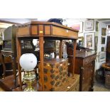 A George III satinwood and crossbanded card table, with double gateleg action, 86cm wide.