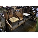 A panelled oak settle, 200cm wide.