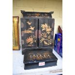 A Japanese lacquer table cabinet, 31cm high; together with another chinoiserie box and cover.