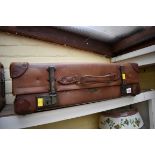 A Revelation vintage leather suitcase.