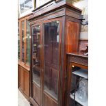 An antique French mahogany and brass bookcase, 106cm wide.