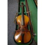 An old violin, with 14 in back, cased and with two bows; together with another small violin,