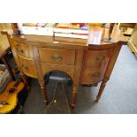 A Regency mahogany sideboard, on reeded legs, 106.5cm wide.