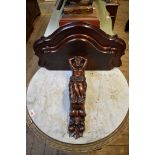 A carved mahogany figural wall bracket, 51cm wide.