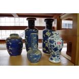 Five various Chinese blue and white vases, one s.d.