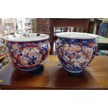 A Japanese Imari jardiniere, 27cm diameter; together with another similar smaller example.