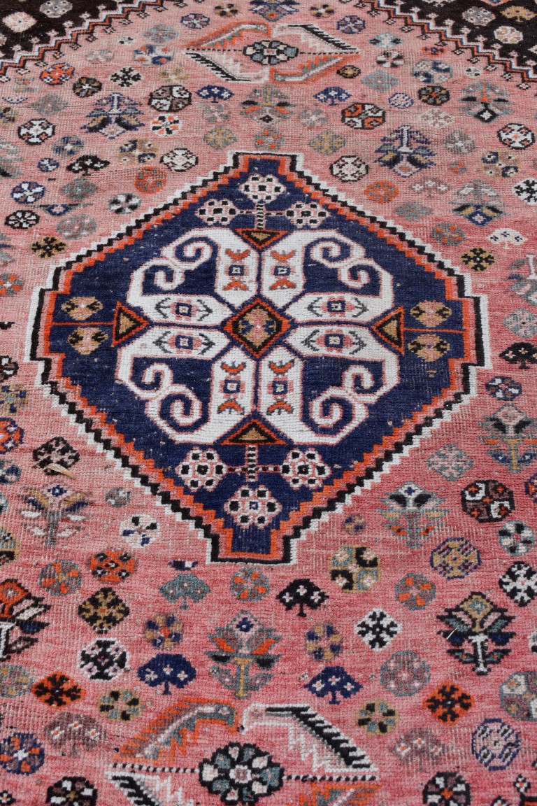 An Eastern wool rug having geometric design on red and brown ground; - Image 2 of 8