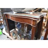 A George III mahogany serpentine card table, 89.5cm wide.