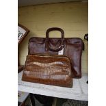 A vintage snakeskin handbag; together with another brown leather bag by 'The Bridge'.
