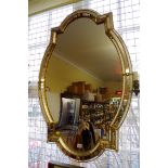 A pair of reproduction Venetian style wall mirrors, 111 x 71.5cm.