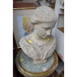 A weathered composition stone classical bust, 45cm high.