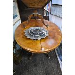 A Victorian walnut and inlaid oval tilt-top loo table, 134cm wide.
