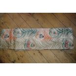 A vintage Japanese silk obi, decorated with chrysanthemums and cranes in flight, 390 x 30.5cm.