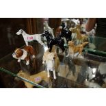 Beswick: five dogs, comprising: dalmatian-small, 1763, gloss; poodle, 1386,