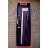 Three vintage fountain pens, two with 14k nib.