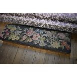 A Victorian upholstered long low stool, 117.5cm wide.