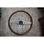 Automobilia: a vintage 15in steering wheel. Condition Report: No makers mark seen.