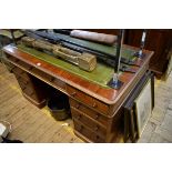 An antique rosewood pedestal desk, 136.5cm wide.