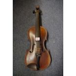 An antique Continental violin, with 14 in back, with ebonized wood case and bow.