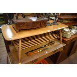 A vintage Ercol elm rectangular low occasional table, 103cm wide.