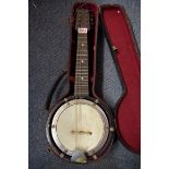 An old English 8 string banjo mandolin, in case.